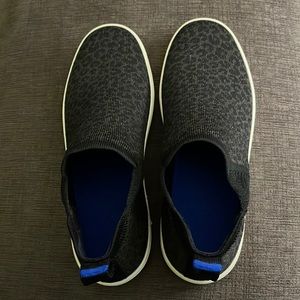 Size 8 Rothy’s The Chelsea sneaker in black and brown print.